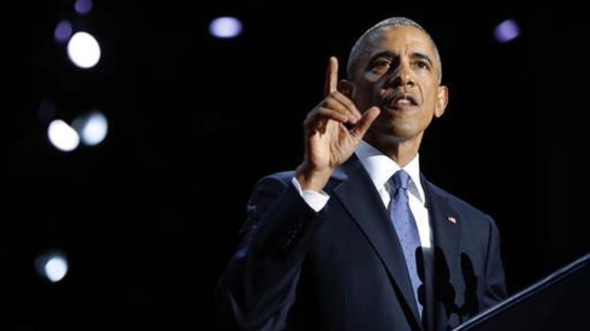 President Obama gestures as he delivers his farewell address in Chicago.