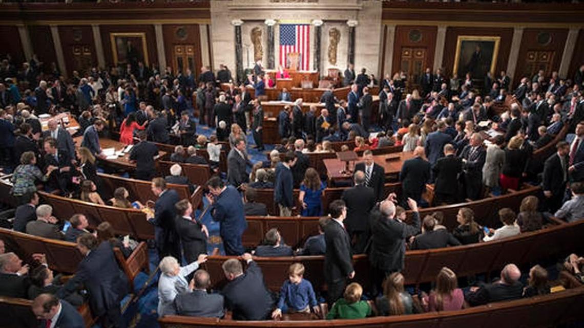 Members of the House of Representatives gather on Tuesday as the 115th Congress gets under way.