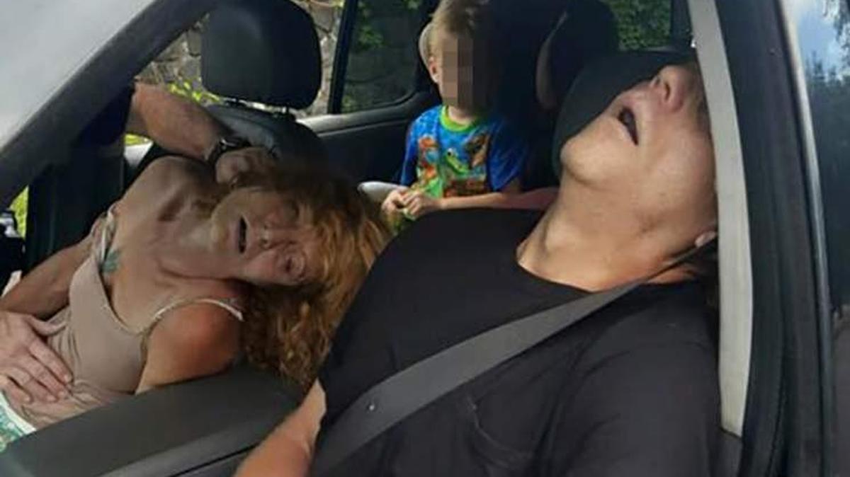 The East Liverpool, Ohio, police shared photos of a couple overdosed on heroin. A 4-year-old child was in the car with them.