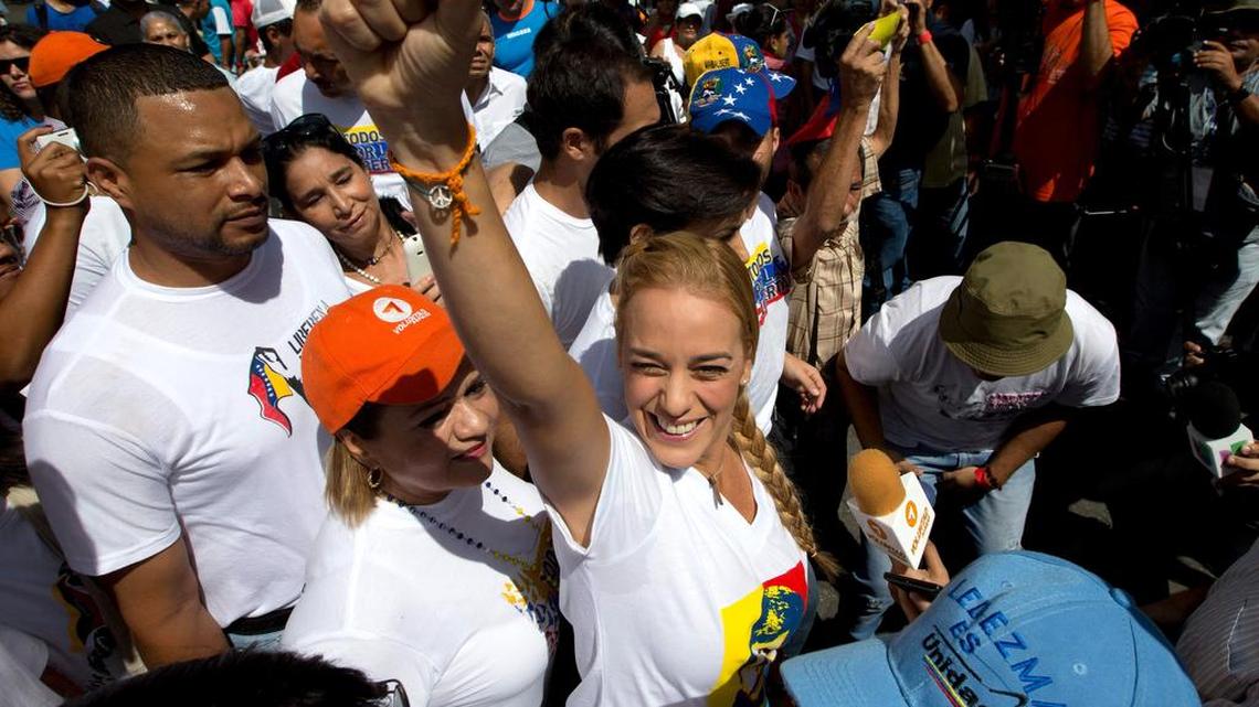 Lilian Tintori, wife of jailed opposition leader Leopoldo López, greets supporters at a campaign rally in Caracas.