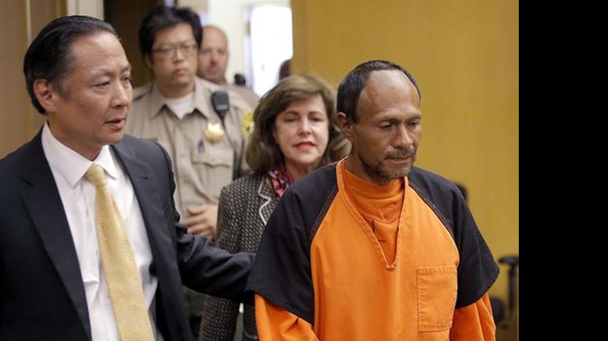 
Juan Francisco Lopez-Sanchez, right, is led into the courtroom for his arraignment at the Hall of Justice in San Francisco earlier this month for the murder of Kathryn Steinle. 
