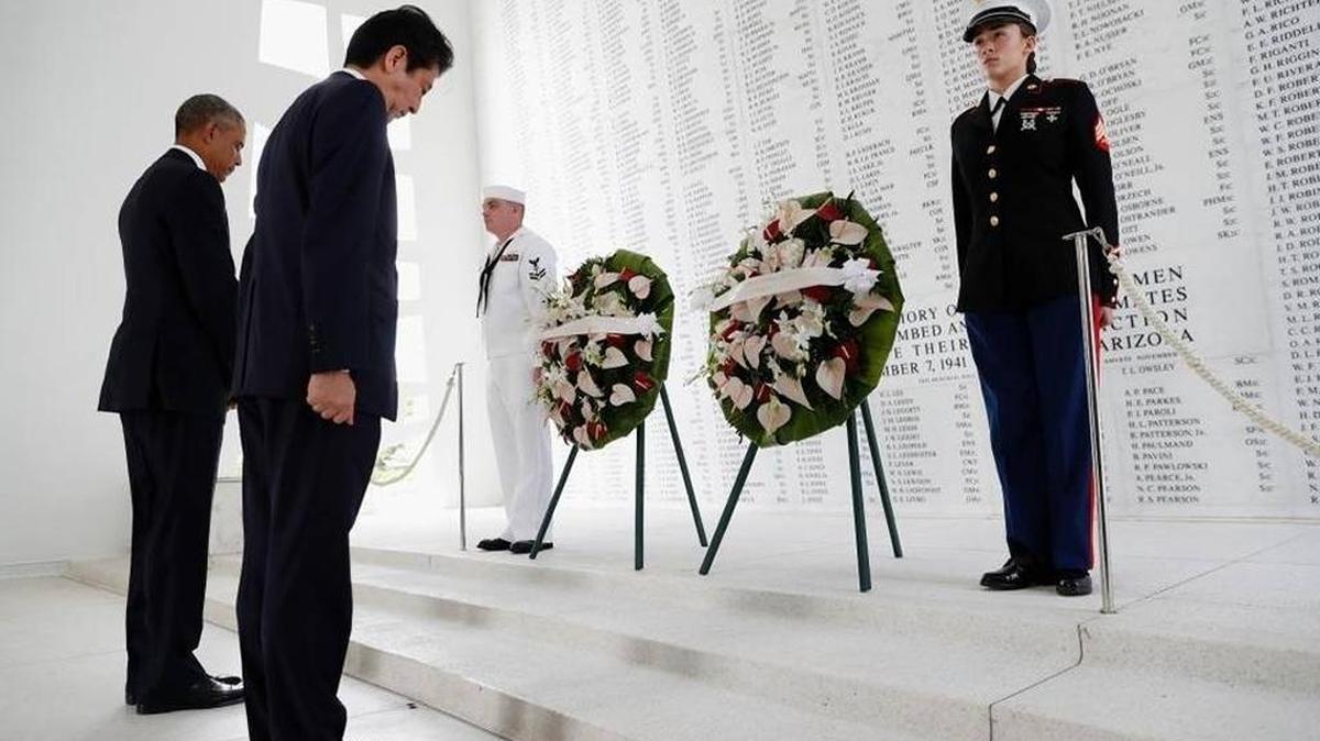 President Obama and Japanese Prime Minister Shinzo Abe lay wreaths Tuesday at the USS Arizona Memorial.