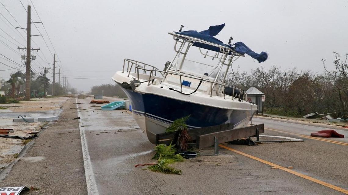 Storm surge from Hurricane Irma lifted a boat onto the Overseas Highway on Summerland Key.