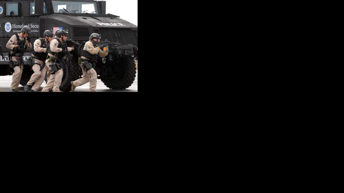 
HOMELAND SECURITY: ICE special agents participate in a training exercise.
