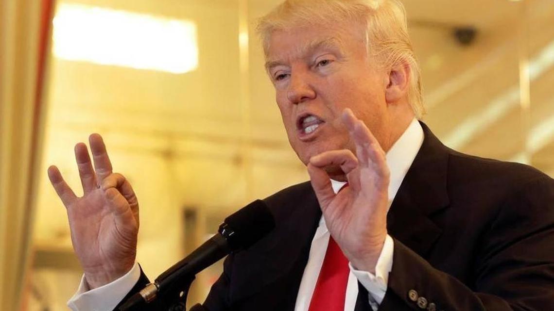 Republican presidential candidate Donald Trump answers questions during a news conference in New York on Tuesday.