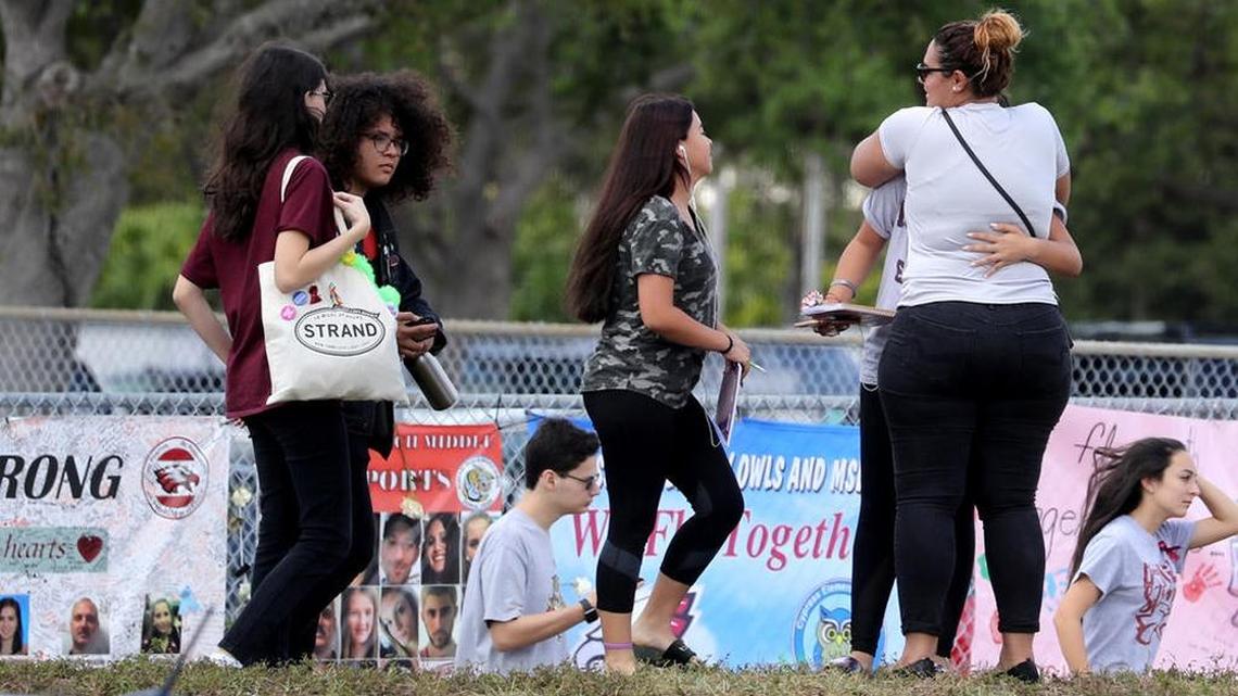 Students at Marjory Stoneman Douglas High School on the first day back to after a gunman killed 17 people at the school on Feb. 14.