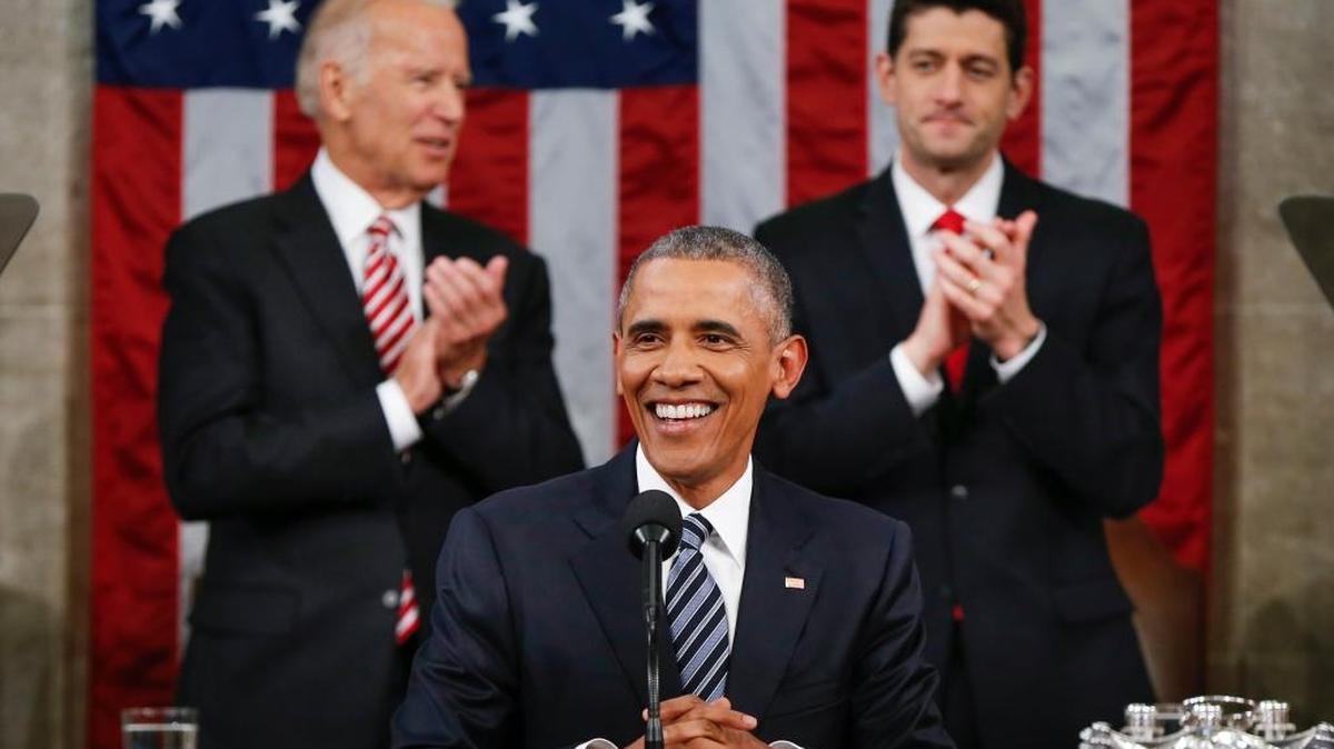 Vice President Joe Biden and Speaker Paul Ryan applaud President Barack Obama during the State of the Union address.
