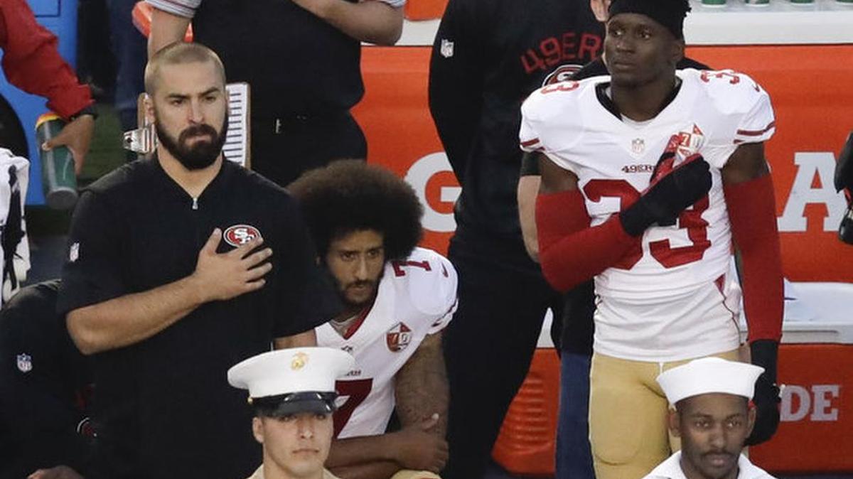 San Francisco 49ers quarterback Colin Kaepernick kneels during the National Anthem before a preseason game Thursday.