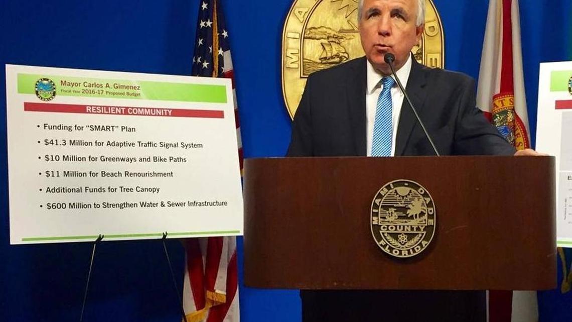 Miami-Dade Mayor Carlos Gimenez unveils the 2017 budget during a press conference at County Hall in downtown Miami.