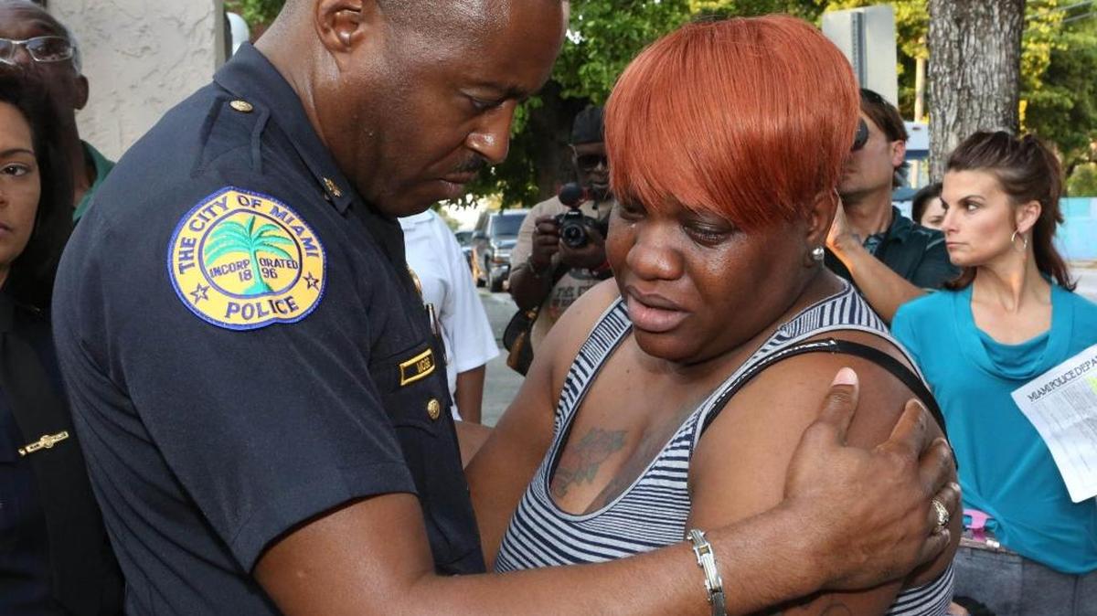Last year, Maj. Delrish Moss consoled Tramele Harris, mother of 16-year-old Richard Hallman, who was shot and killed in Overtown.