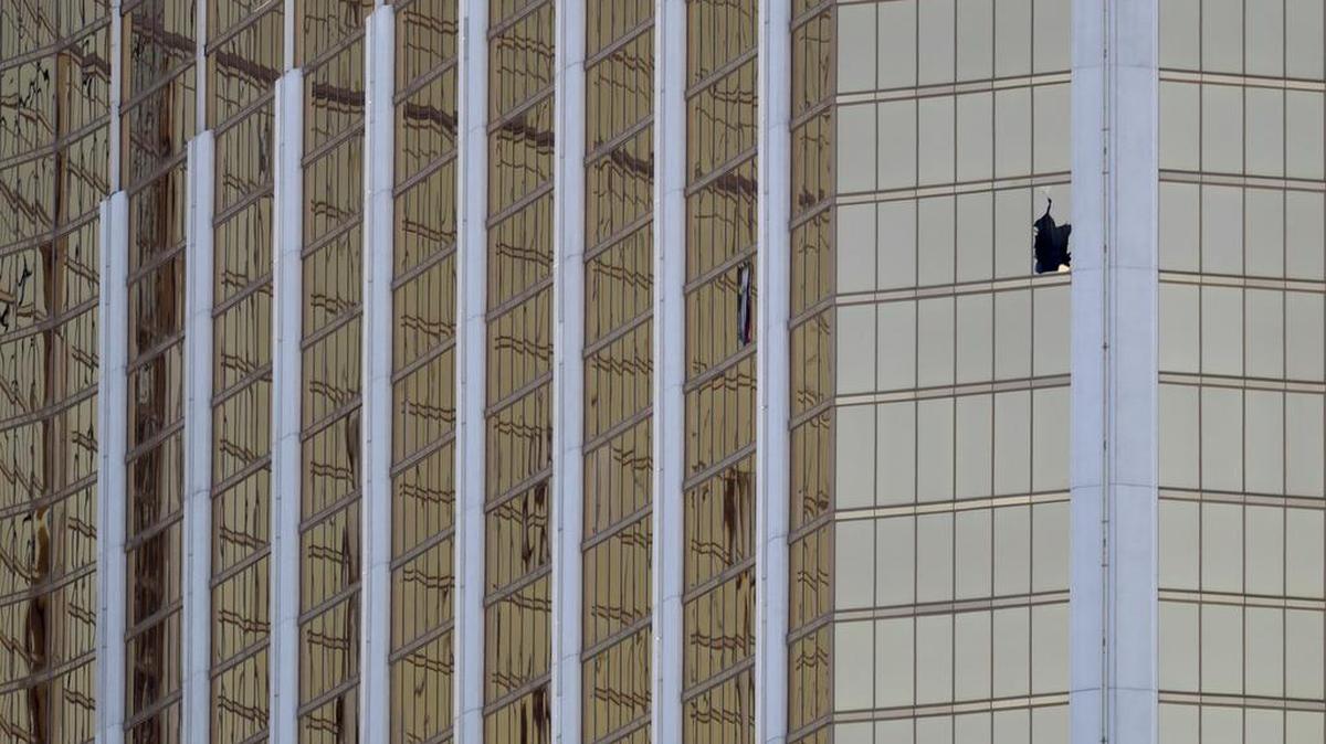 The shooter’s vantage point - one of two broken windows on the 32nd floor of the Mandalay Bay Resort and Casino.