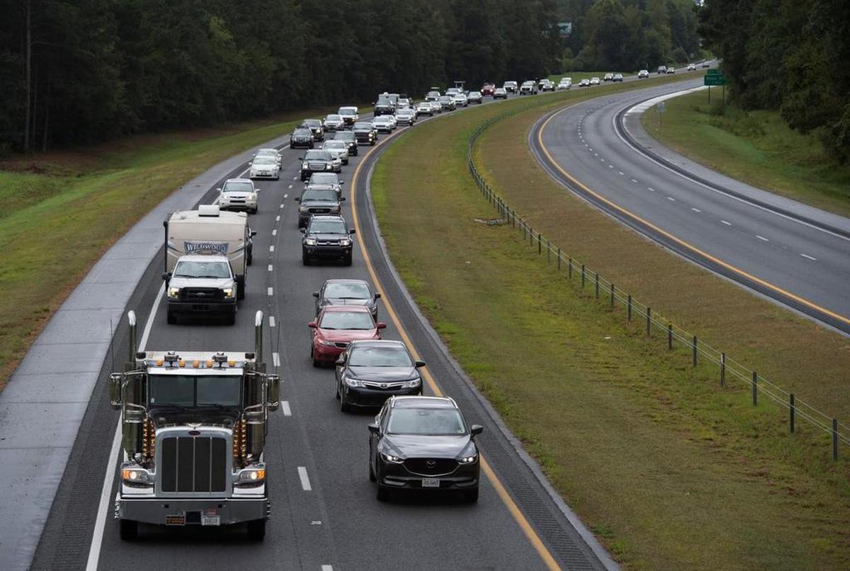 Residents evacuate from coastal areas near Wallace, N. C., as Hurricane Florence approaches.