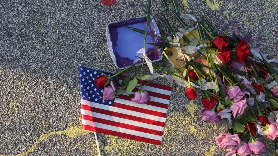 A make-shift memorial for shooting victims rests on Orange Avenue in Orlando.