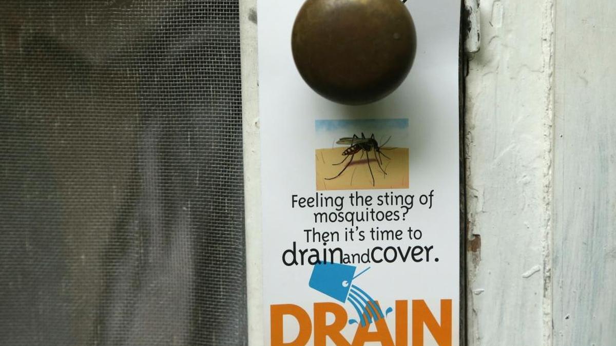 A flyer left on the doorknob of a home by an inspector from the Miami-Dade County Mosquito Control department on Tuesday.
