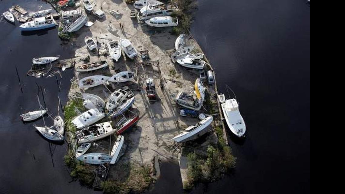 
AFTER THE STORM: In 2004, Hurricane Charley left a jumble of boats piled up on Pine Island, on Florida’s Gulf Coast. 
