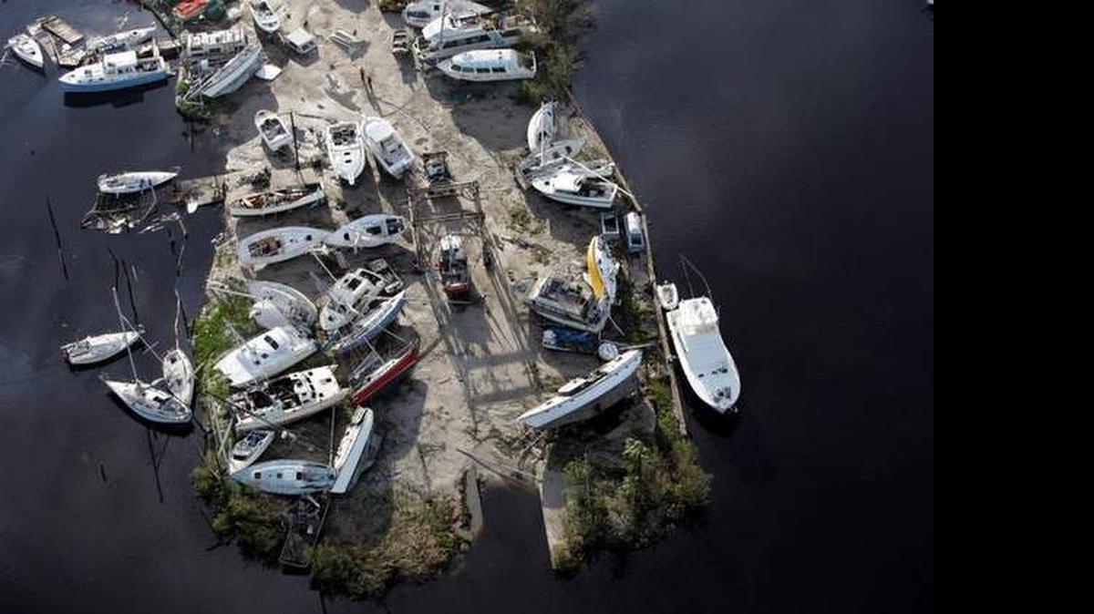 
AFTER THE STORM: In 2004, Hurricane Charley left a jumble of boats piled up on Pine Island, on Florida’s Gulf Coast. 
