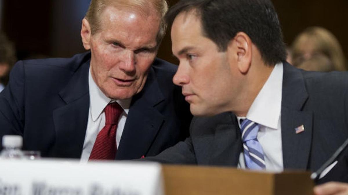 Florida Sens. Marco Rubio, right, and Bill Nelson are pushing legislation that would allow authorites to seize weapons from anyone deemed a threat.