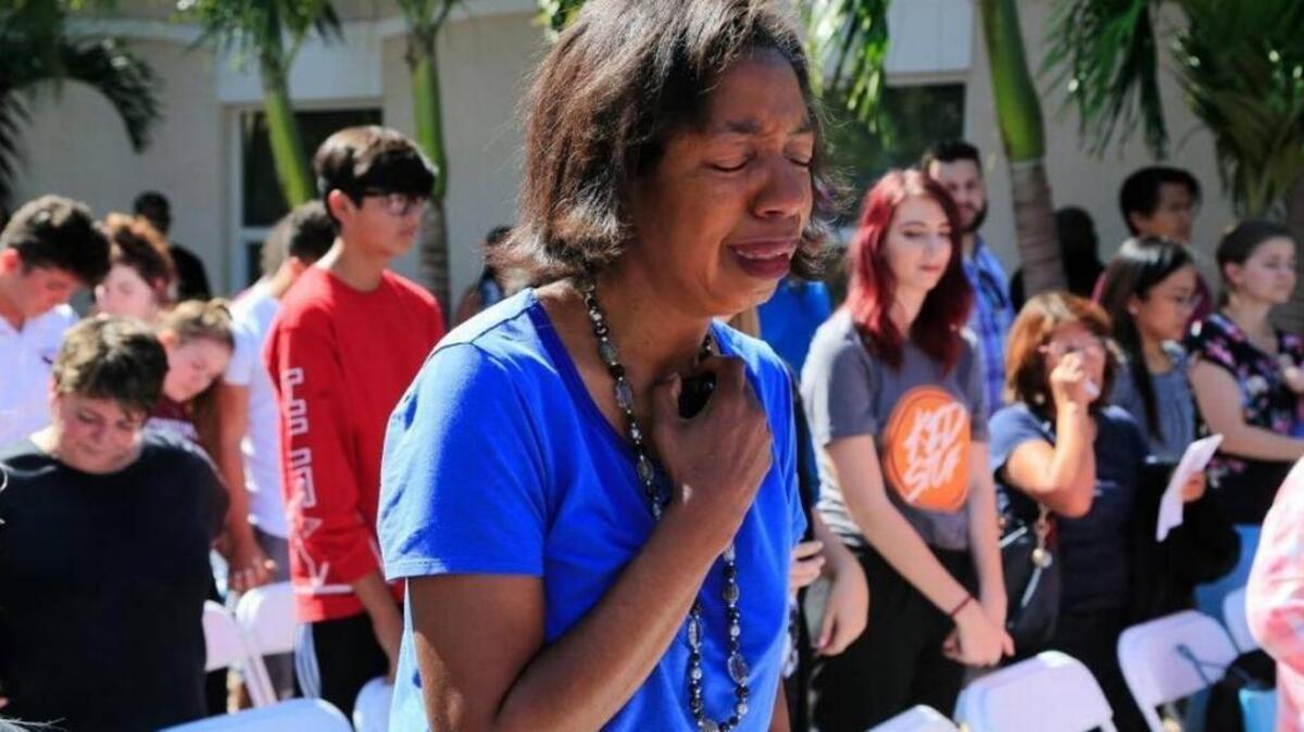 Mourners attend a community prayer vigil at Parkridge Church for shooting victims from Marjory Stoneman Douglas High School.