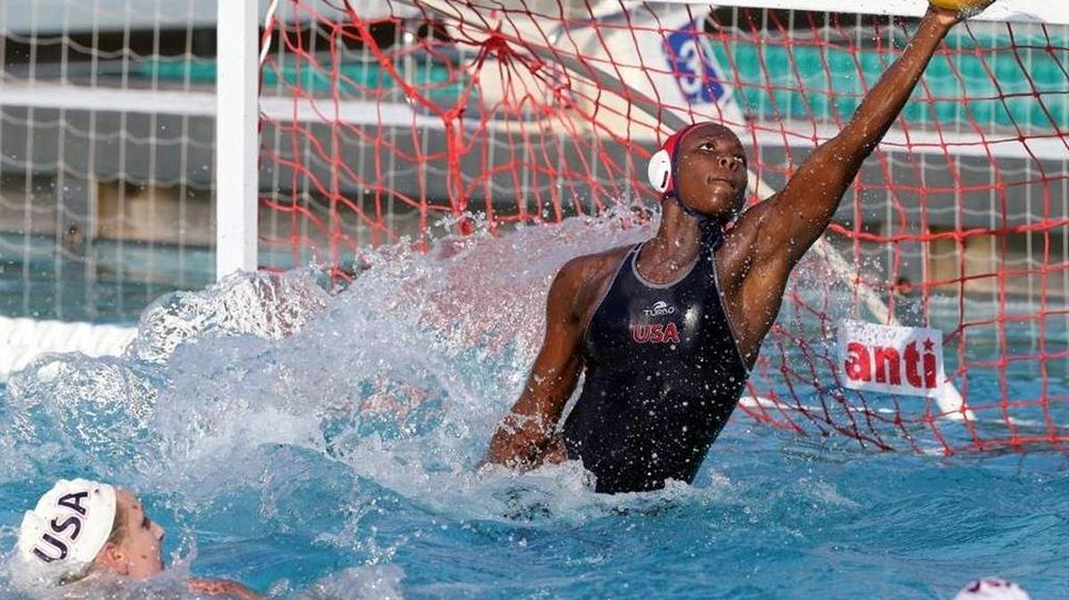 Miami goalie Ashleigh Johnson of the U.S. women’s water polo team, blocks a shot. Johnson helped the team win gold in Rio.
