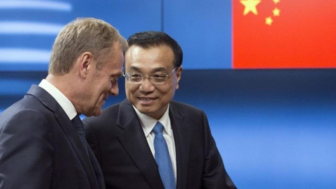 Chinese Premier Li Keqiang, right, speaks with European Council President Donald Tusk at the China-European Union summit in Brussels.