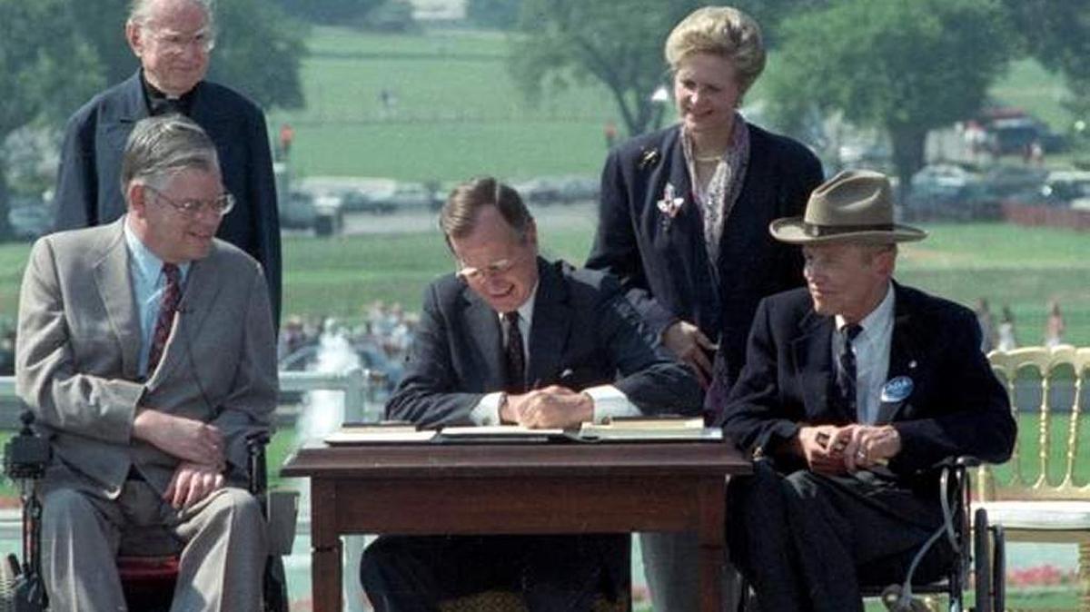 President George H.W. Bush signed the ADA into law in 1990.