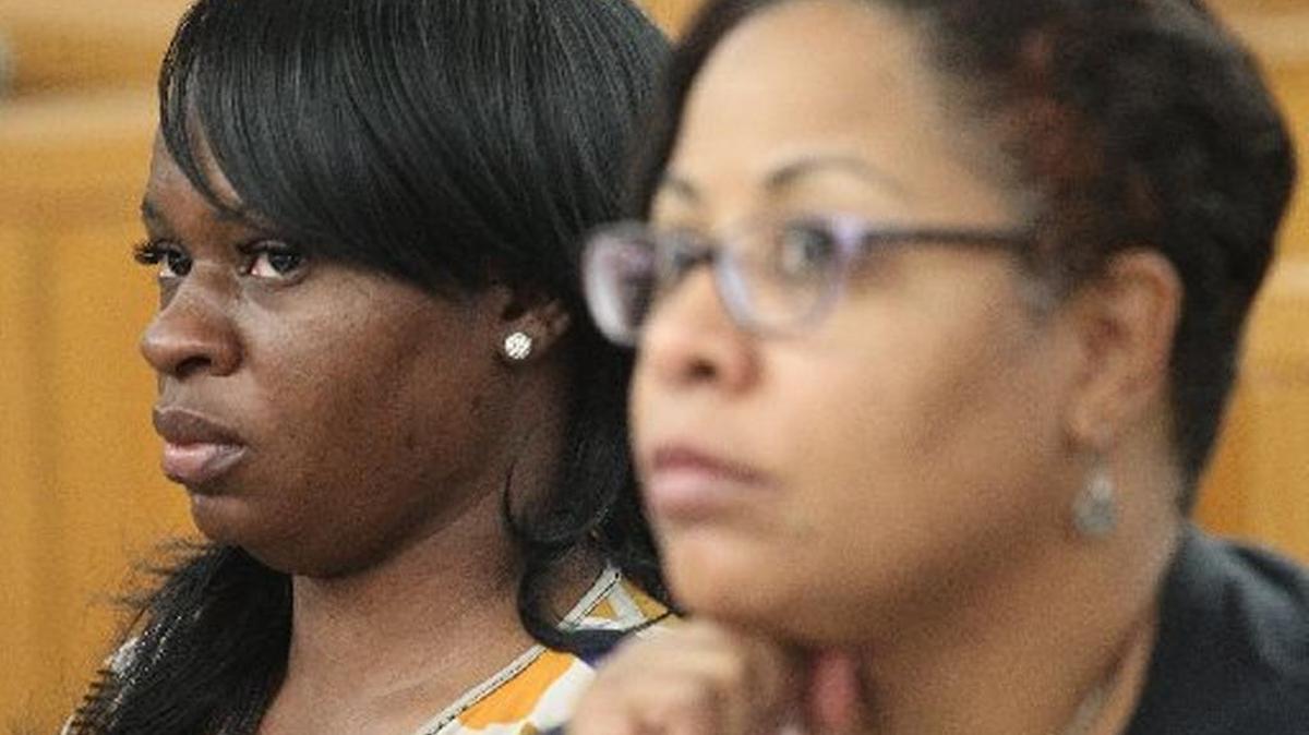 Last month, Marjorie Dufrene, left, appears in front of Judge Cindy Lederman in Miami.