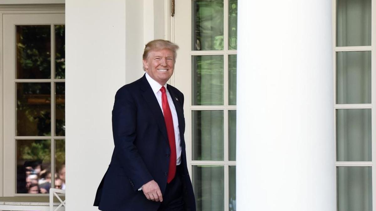 President Donald Trump arrives to make his statement on U.S. withdrawal from the Paris Accord.