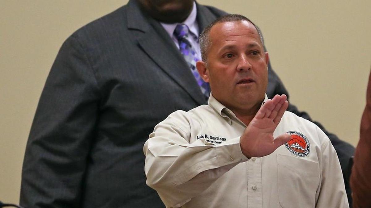 Former Opa-locka City Manager David Chiverton, left, is going to prison. Commissioner Luis B. Santiago might be indicted.