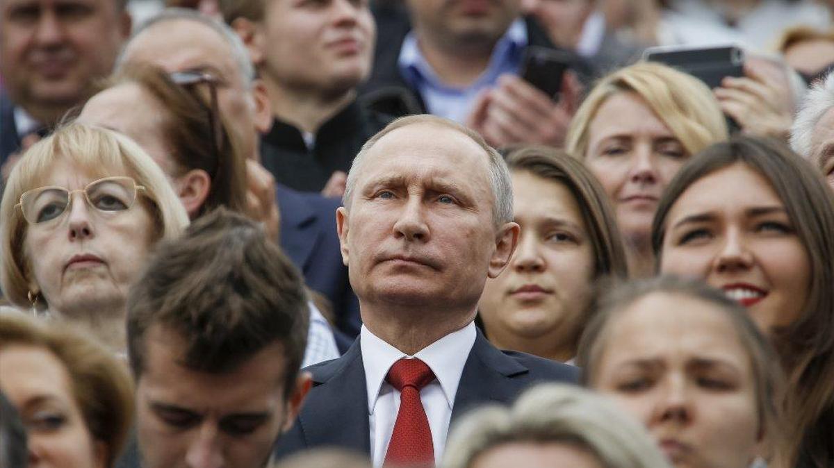 Russian President Vladimir Putin watches celebrations of the Day of the City in Red Square in Moscow on Sept. 10.