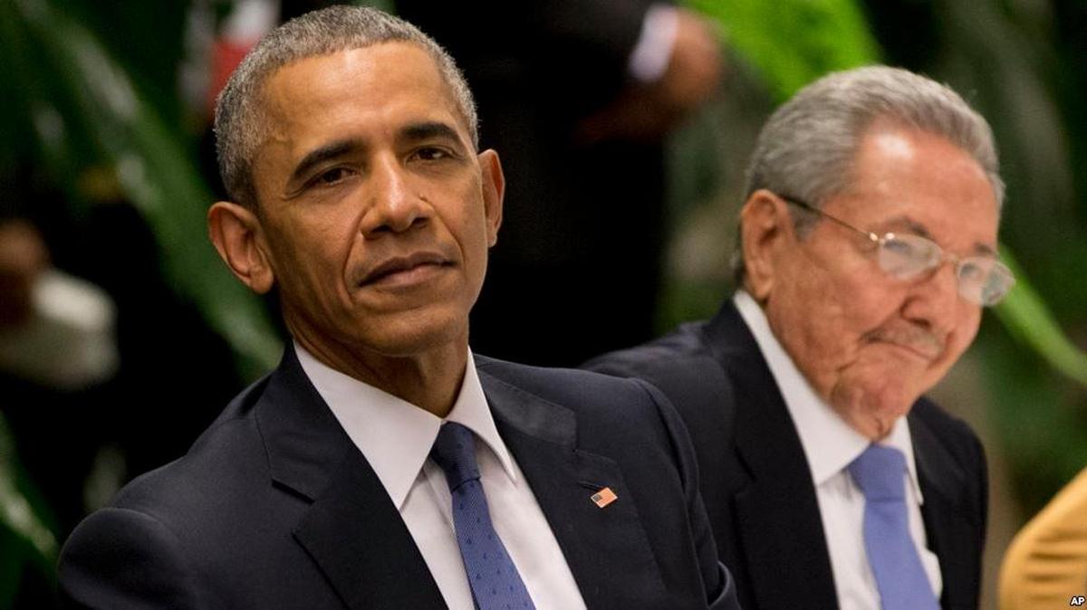 Just last year, President Barack Obama, left, listens to a live band along with Cuba's President Raul Castro during a state dinner on the isalnd.