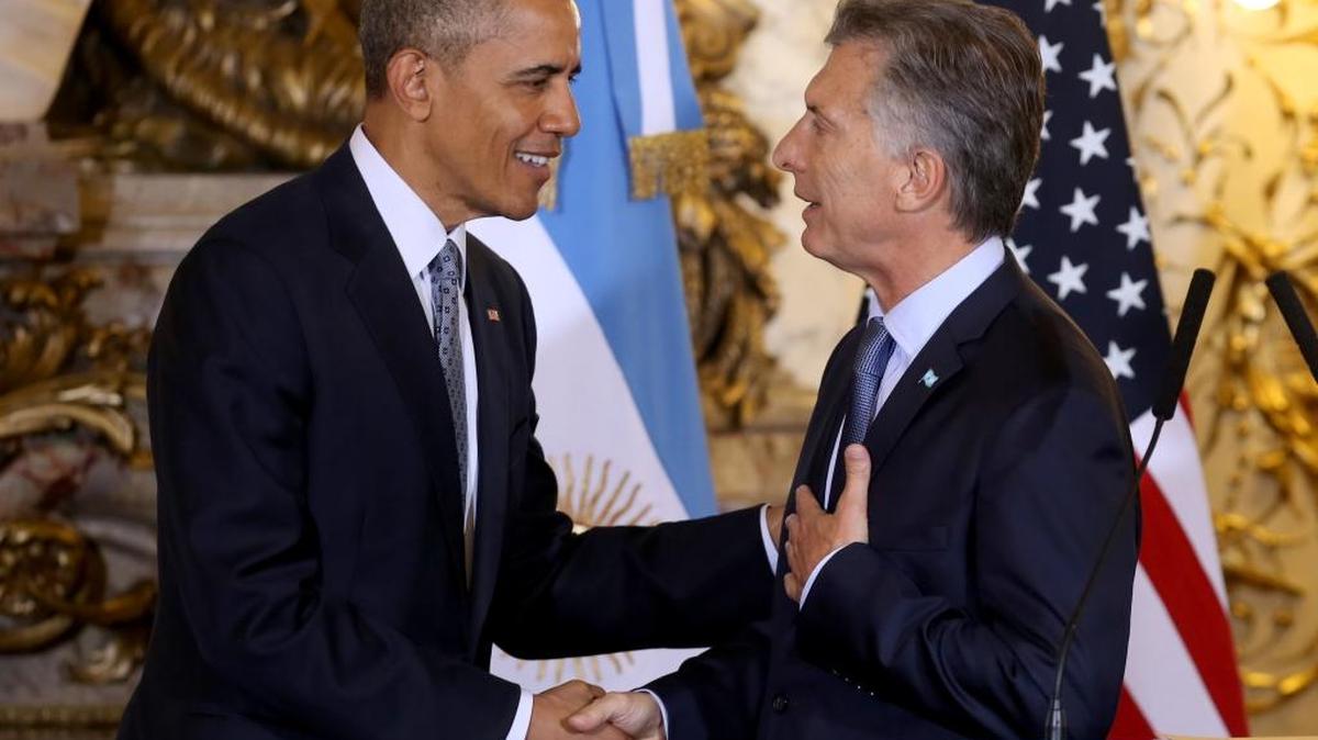 U.S. President Barack Obama shakes hands with Argentina’s President Mauricio Macri at the government house in Buenos Aires.