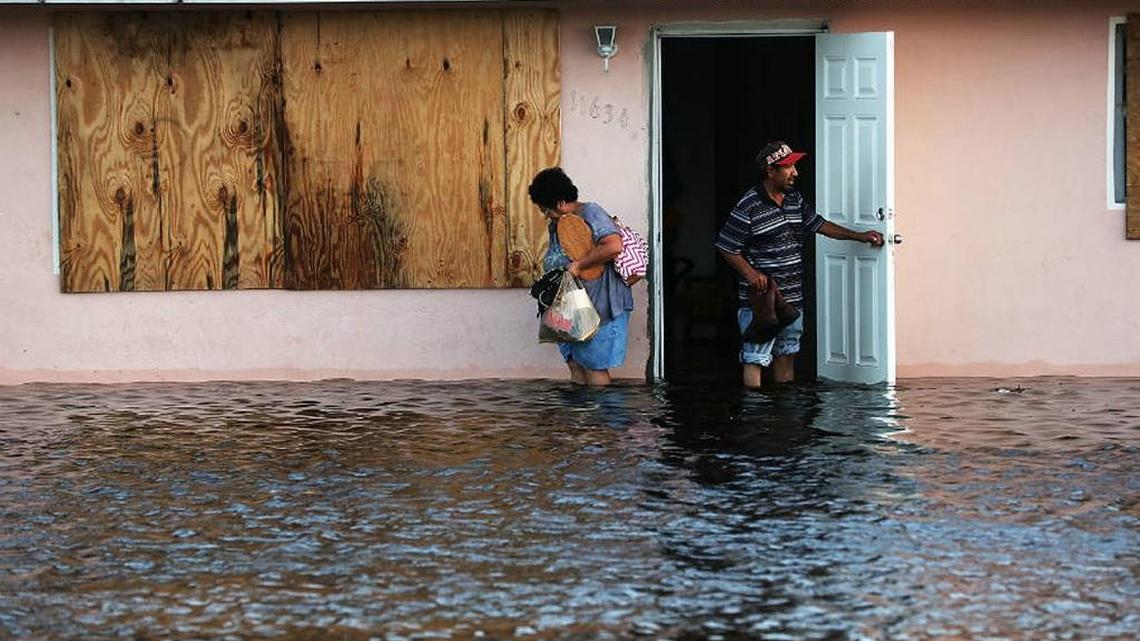 In September 2017, Hurricane Irma’s powerful storm surge flooded Florida homes, such as this one in Fort Myers, and damaged infrastructure.