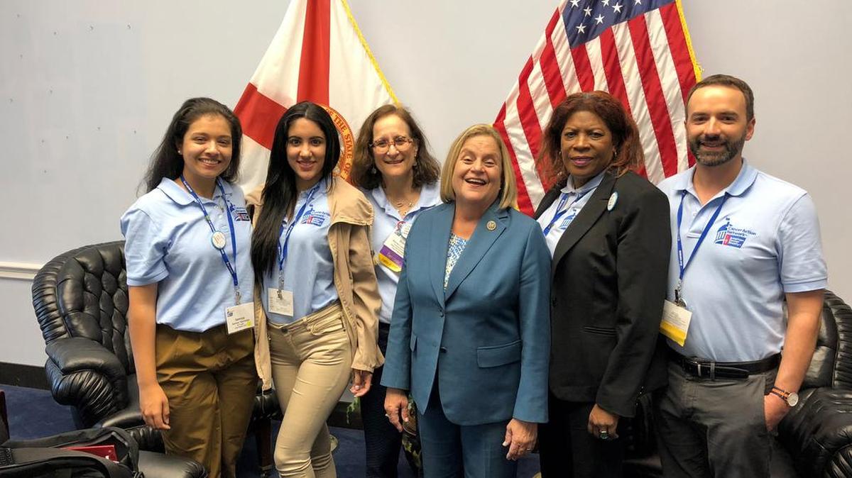 Volunteers with the American Cancer Society Cancer Action Network pose with Congresswoman Ros-Lehtinen