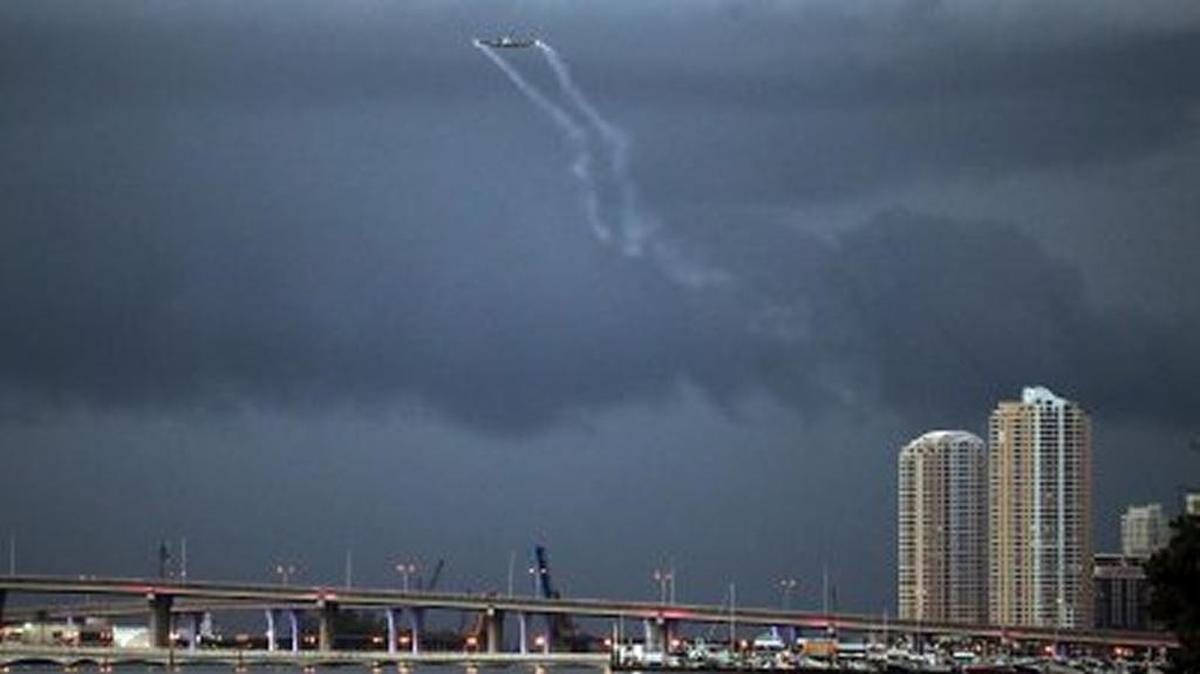 In 2016, a plane sprays pesticide over parts of Miami to reduce the number of mosquitoes that could be carrying Zika.