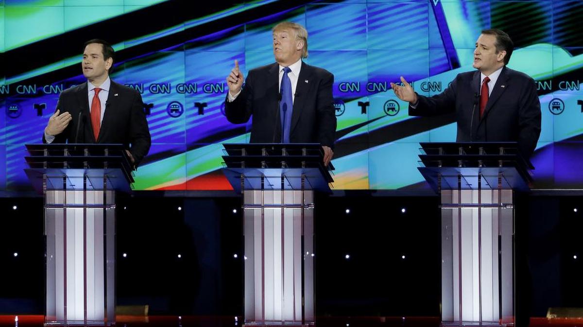 Republican presidential candidates Marco Rubio, left, and Ted Cruz, right, slammed Donald Trump, center, at Thursday night’s debate in Houston.