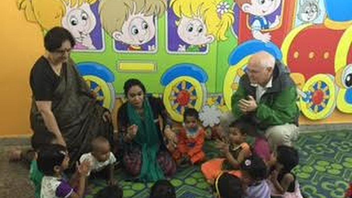 In New Delhi, David Lawrence Jr., right, observes the activity in an early learning classroom with Venita Kaul, left, and teacher Saba Parveen.