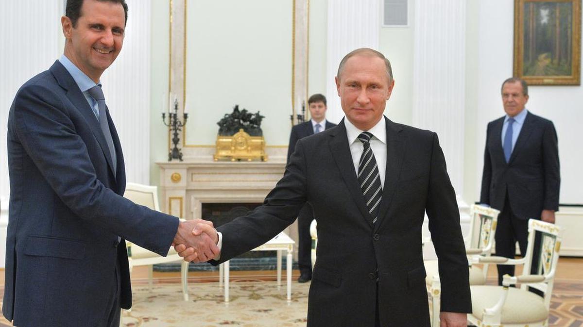 Syria’s Bashar Assad, left, and Russia’s Vladimir Putin have both been implicated in the ‘Panama Papers’ scandal.