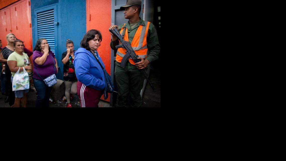 
SHORTAGES: People line up outside the Dia a Dia supermarket in Caracas one day after the government took over the chain of stores to punish businesses it blames for worsening shortages.
