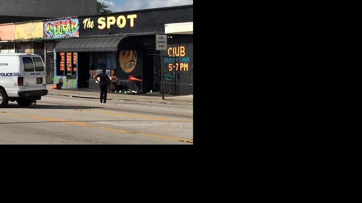 
LIBERTY CITY: Police investigate site of Sunday’s mass shooting in Miami. 
