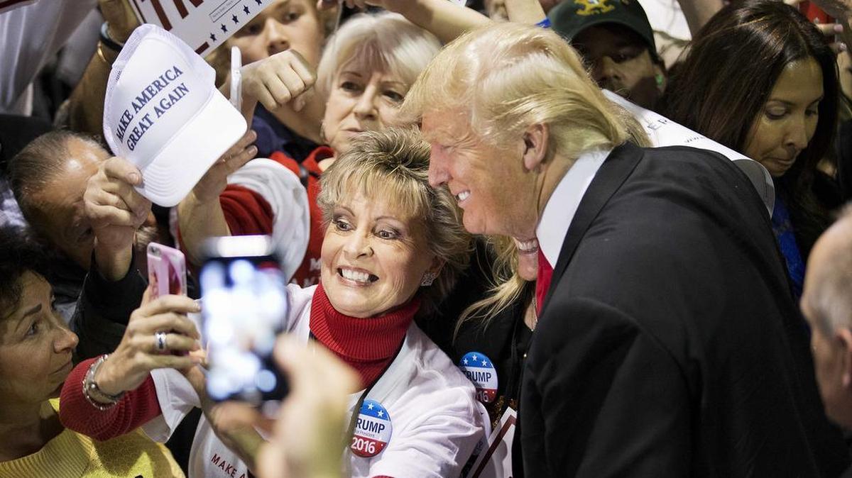 Donald Trump was mobbed by admiring supporters at a campaign rally in Georgia on Sunday.