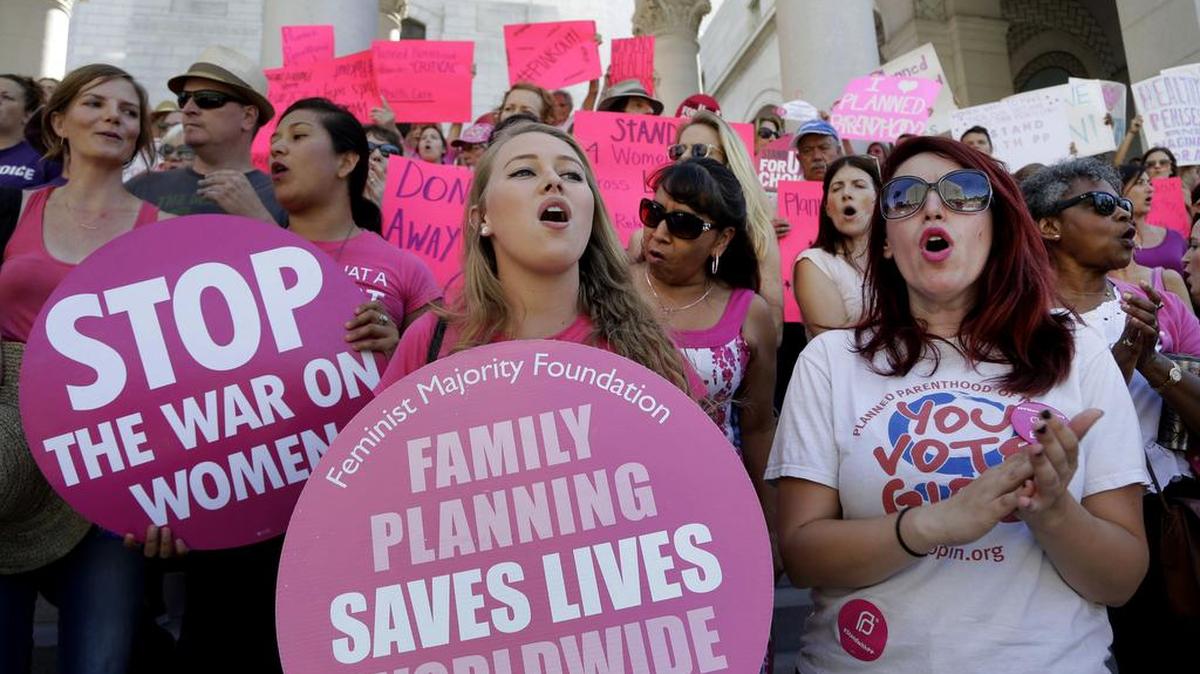 
Planned Parenthood supporters in Los Angeles rally for women’s access to reproductive health care last week.
