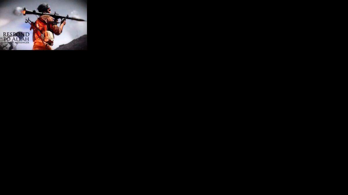 
RECRUITMENT TOOL: A still image of a man firing a rocket-propelled grenade taken from an undated Islamic State video.
