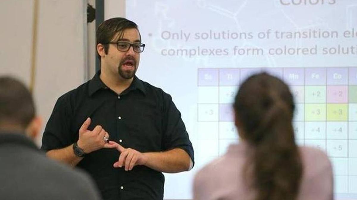 Before DACA, Tomás Pendola, 26, sold magic tricks at Bayside Marketplace. Now he teaches advanced-placement chemistry at MAST Academy on Key Biscayne.