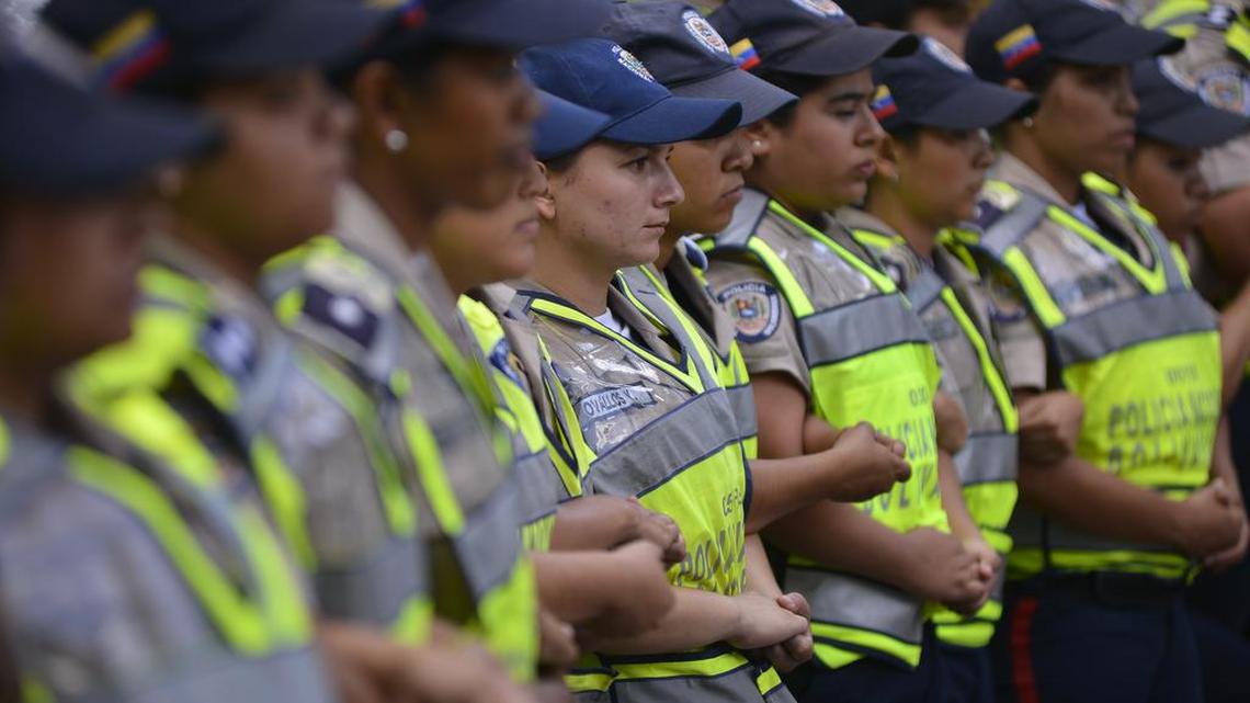 Bolivarian National Police stand guard near the Central University of Venezuela last week during pro-opposition students protests in Caracas.