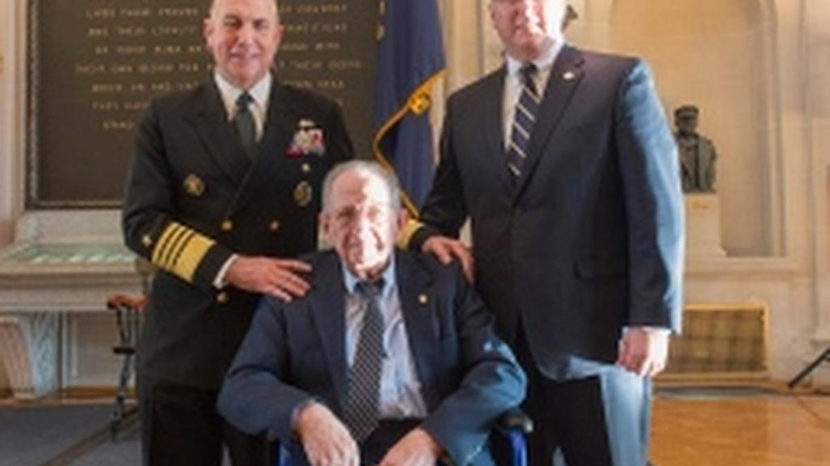Adm. Kurt Tidd, left, is joined by his older brother, retired Rear Adm. Mark Tidd, right, and his father, retired Vice Adm. Emmett H. Tidd, seated, on the day he received his fourth star. He will take over U.S. Southern Command on Thursday.