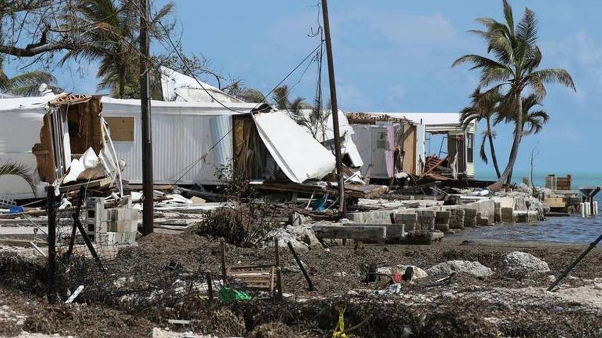Destroyed homes at the Seabreeze trailer park along the Overseas Highway in the Florida Keys left scores homeless. HUD Secretary Ben Carson says his agency is ready to help.