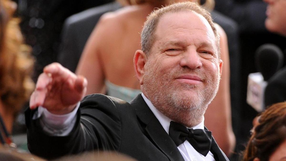 Harvey Weinstein arriving at a red carpet event in Hollywood.