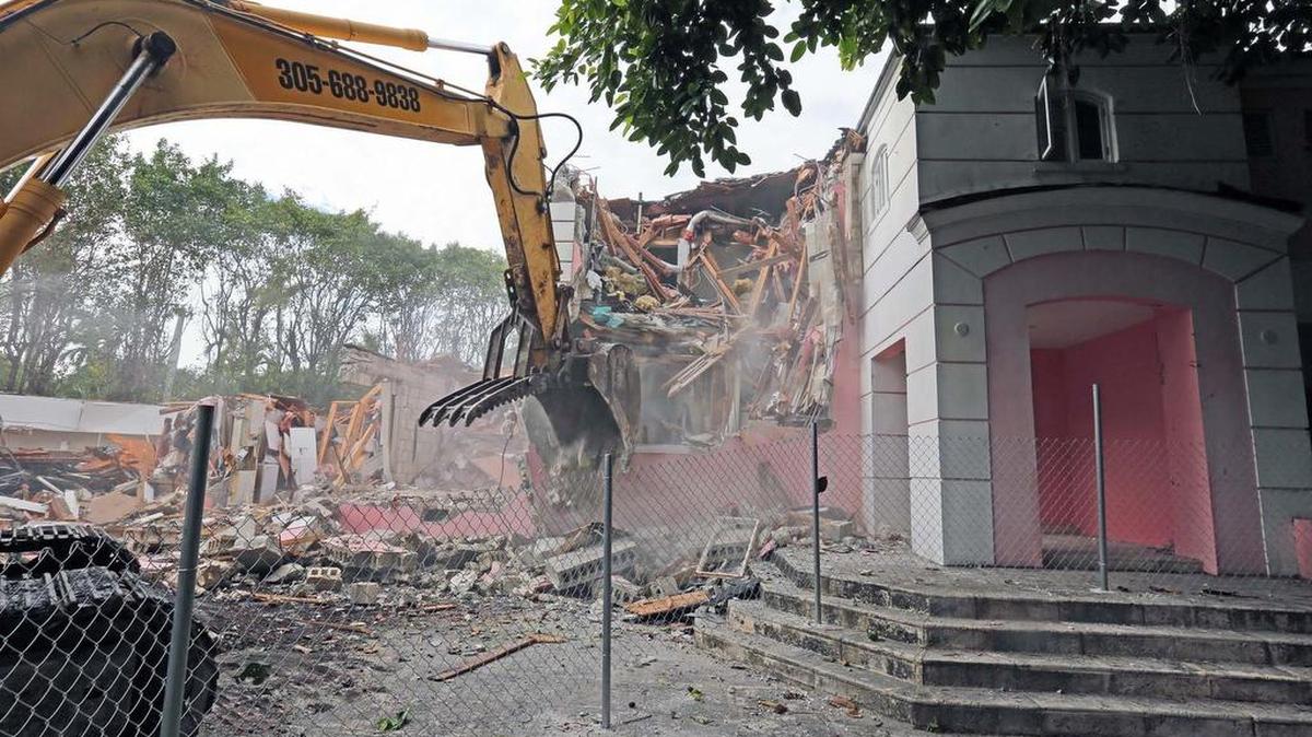 Demolition crews tear down the Miami Beach house that once belonged to Colombian drug lord Pablo Escobar on North Bay Road.