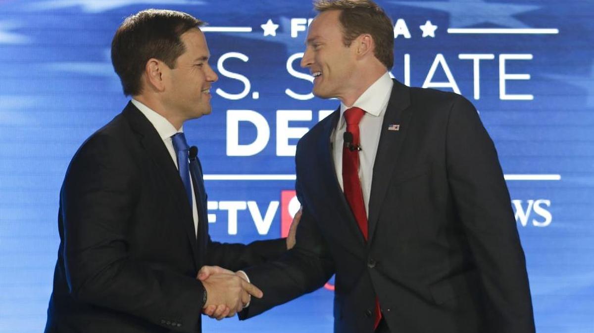 Sen. Marco Rubio, left, and Rep. Patrick Murphy, shake hands before their debate at the University of Central Florida in October.