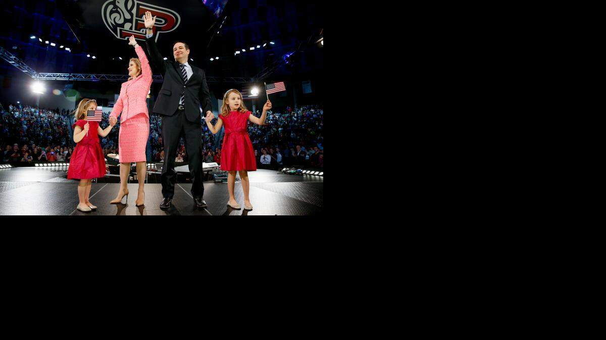 
IN THE RACE: Sen. Ted Cruz, R-Texas, his wife Heidi, and their two daughters Catherine, 4, left, and Caroline, 6, right, wave on stage after he announced his campaign for president on Monday.
